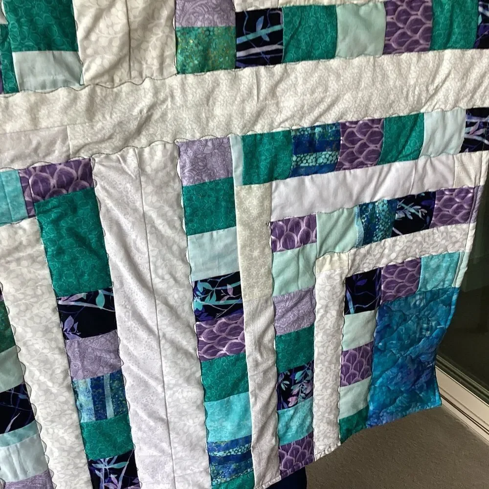 NWT. Hand Crafted Quilt of Blues, Purples and Turquoises